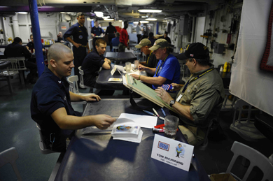 Cartoonists On Aircraft Carrier